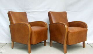 Art Deco leather armchairs.